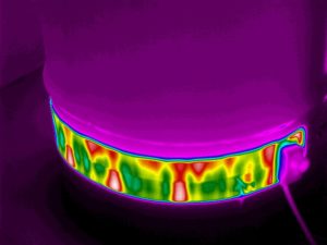 thermal imaging of traditional band heater with hot and cold spots