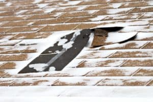 Roofing in Cold Weather Damaged Shingles