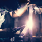 welder using a torch